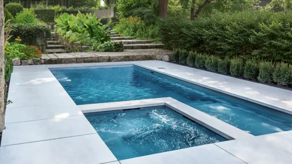 Hero_Limitless_style-webp Leisure Pools Infinity large fiberglass swimming pool with built-in spa and splash deck